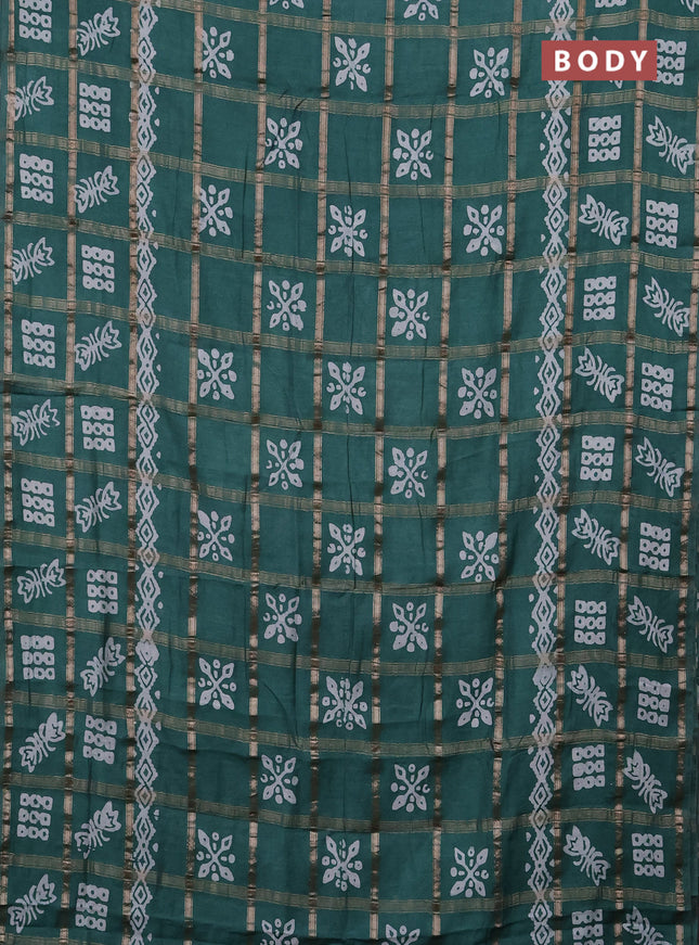 Semi chanderi saree teal green with allover zari checks & batik prints in borderless style