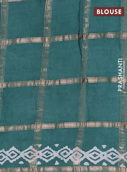 Semi chanderi saree teal green with allover zari checks & batik prints in borderless style