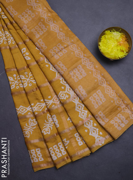 Semi chanderi saree mustard yellow with allover zari checks & batik prints in borderless style