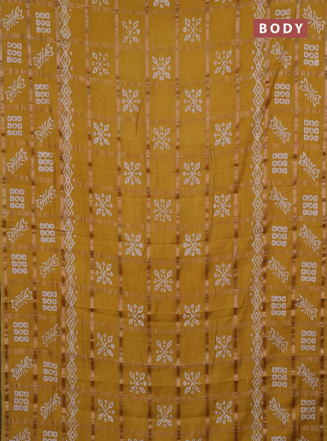 Semi chanderi saree mustard yellow with allover zari checks & batik prints in borderless style