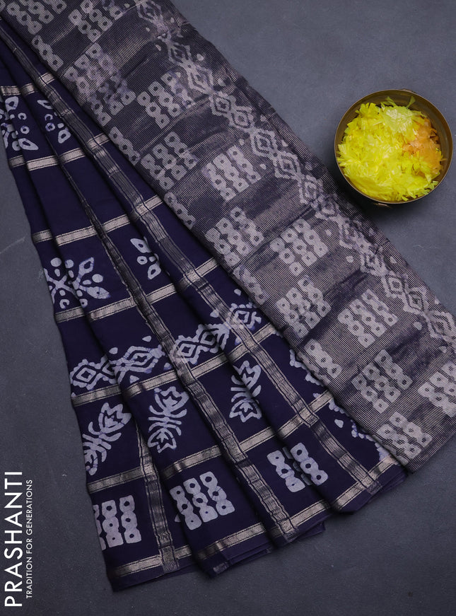 Semi chanderi saree navy blue with allover zari checks & batik prints in borderless style