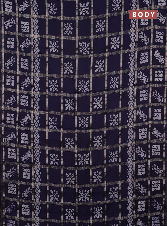 Semi chanderi saree navy blue with allover zari checks & batik prints in borderless style