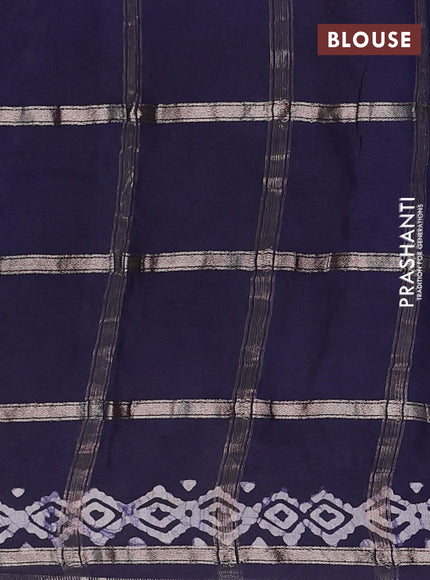 Semi chanderi saree navy blue with allover zari checks & batik prints in borderless style