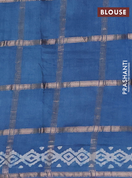 Semi chanderi saree blue shade with allover zari checks & batik prints in borderless style