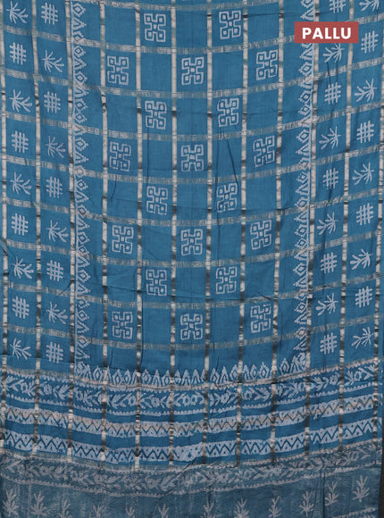 Semi chanderi saree teal green with allover zari checks & batik prints in borderless style
