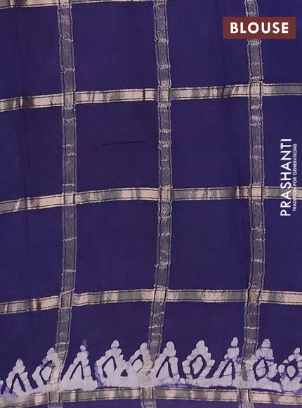 Semi chanderi saree navy blue with allover zari checks & batik prints in borderless style