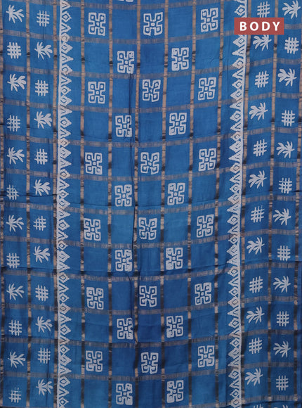 Semi chanderi saree blue with allover zari checks & batik prints in borderless style