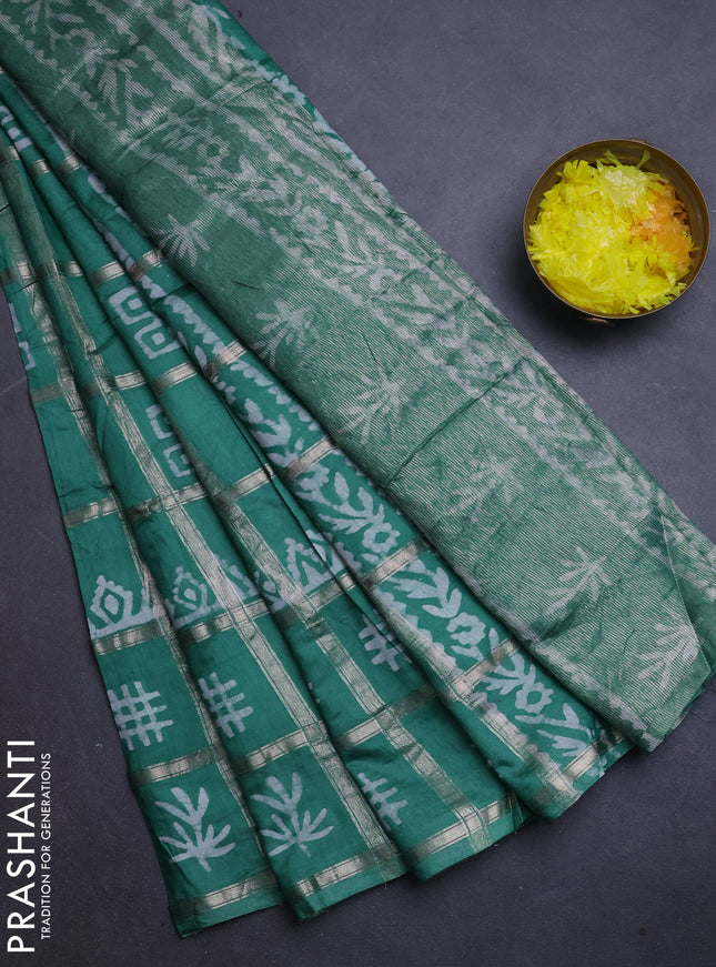 Semi chanderi saree green with allover zari checks & batik prints in borderless style
