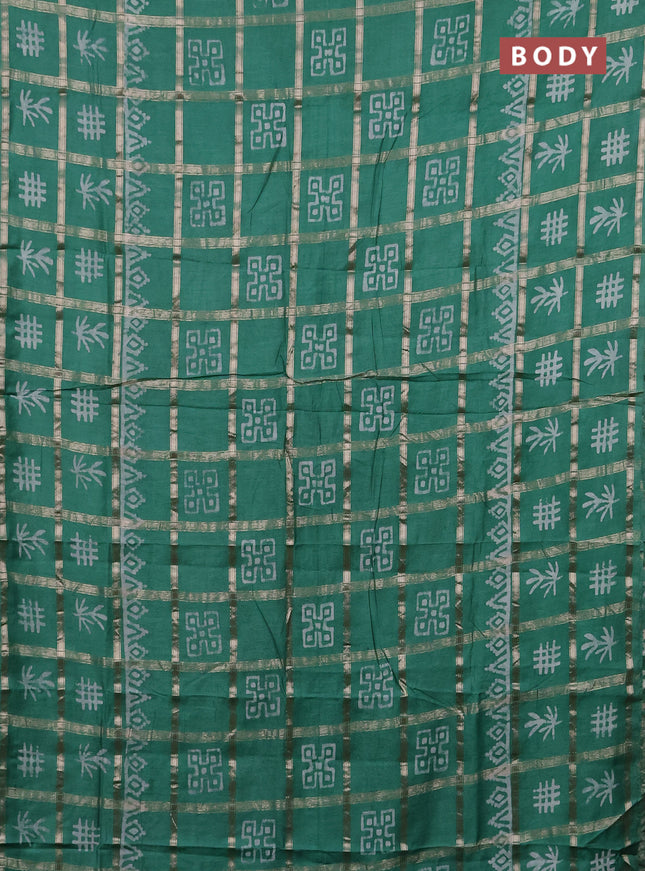 Semi chanderi saree green with allover zari checks & batik prints in borderless style