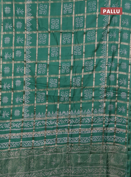 Semi chanderi saree green with allover zari checks & batik prints in borderless style