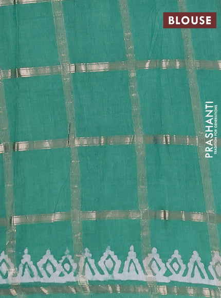 Semi chanderi saree green with allover zari checks & batik prints in borderless style