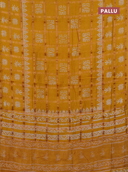 Semi chanderi saree mustard yellow with allover zari checks & batik prints in borderless style