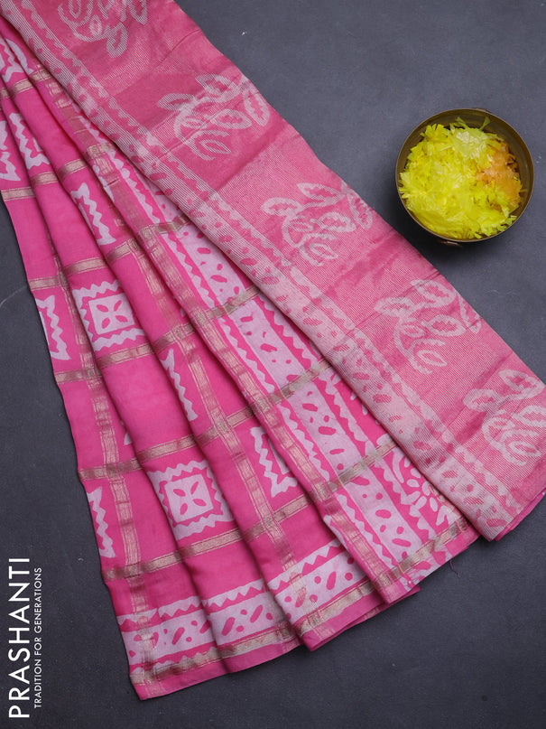 Semi chanderi saree light pink and off white with allover zari checks & batik prints and batik printed border