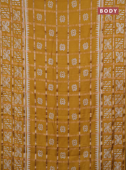 Semi chanderi saree mustard yellow and off white with allover zari checks & batik prints and batik printed border