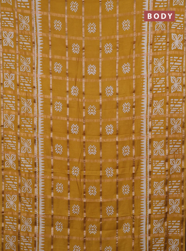 Semi chanderi saree mustard yellow and off white with allover zari checks & batik prints and batik printed border