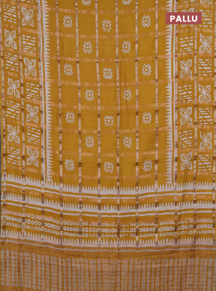 Semi chanderi saree mustard yellow and off white with allover zari checks & batik prints and batik printed border