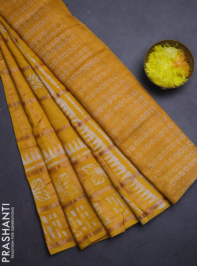 Semi chanderi saree mango yellow and off white with allover zari checks & batik prints and batik printed border