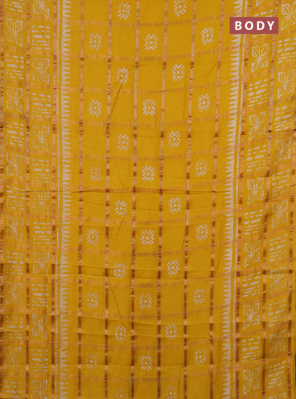 Semi chanderi saree mango yellow and off white with allover zari checks & batik prints and batik printed border