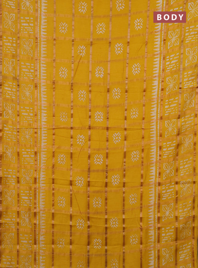 Semi chanderi saree mango yellow and off white with allover zari checks & batik prints and batik printed border
