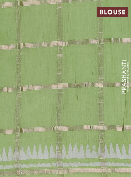 Semi chanderi saree pista green and off white with allover zari checks & batik prints and batik printed border