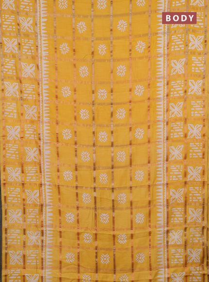 Semi chanderi saree yellow and off white with allover zari checks & batik prints and batik printed border
