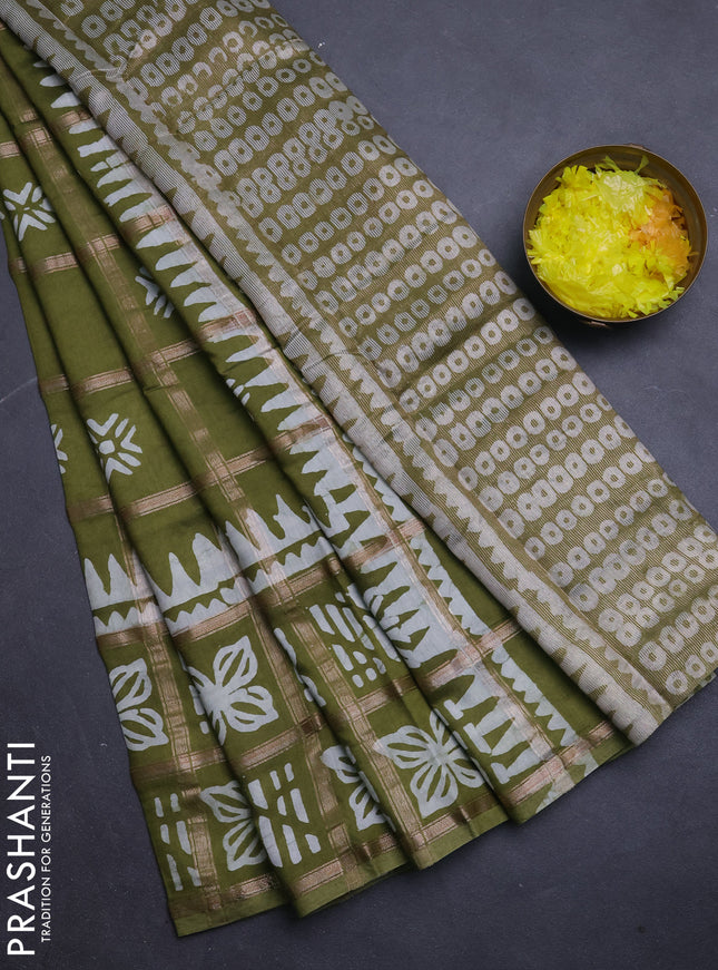 Semi chanderi saree mehendi green and off white with allover zari checks & batik prints and batik printed border