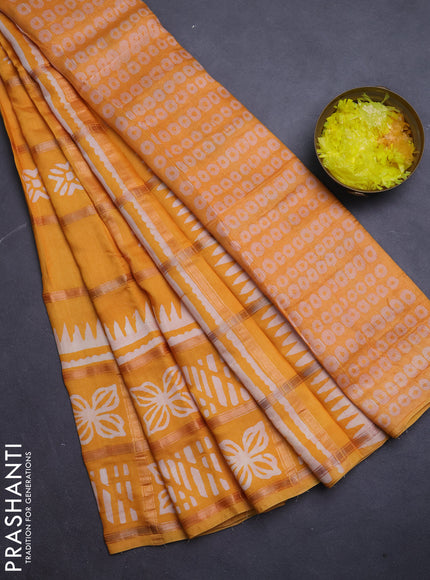 Semi chanderi saree mango yellow and off white with allover zari checks & batik prints and batik printed border