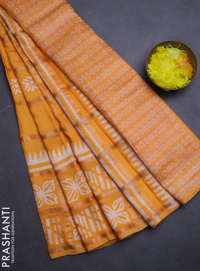 Semi chanderi saree mango yellow and off white with allover zari checks & batik prints and batik printed border