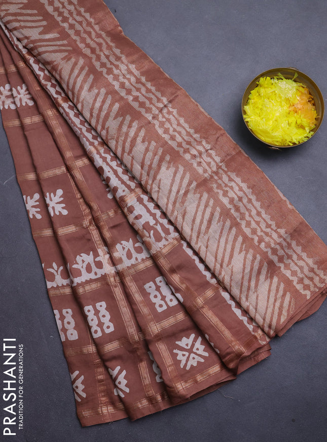 Semi chanderi saree pastel brown with allover zari checks & batik prints in borderless style
