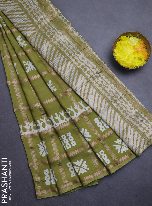 Semi chanderi saree olive green with allover zari checks & batik prints in borderless style