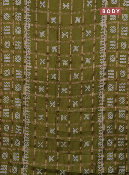 Semi chanderi saree olive green with allover zari checks & batik prints in borderless style