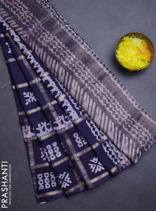 Semi chanderi saree navy blue with allover zari checks & batik prints in borderless style