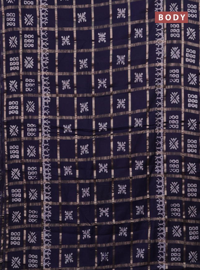 Semi chanderi saree navy blue with allover zari checks & batik prints in borderless style