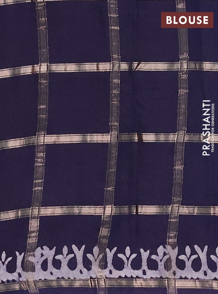 Semi chanderi saree navy blue with allover zari checks & batik prints in borderless style