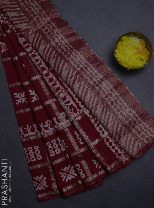 Semi chanderi saree maroon with allover zari checks & batik prints in borderless style