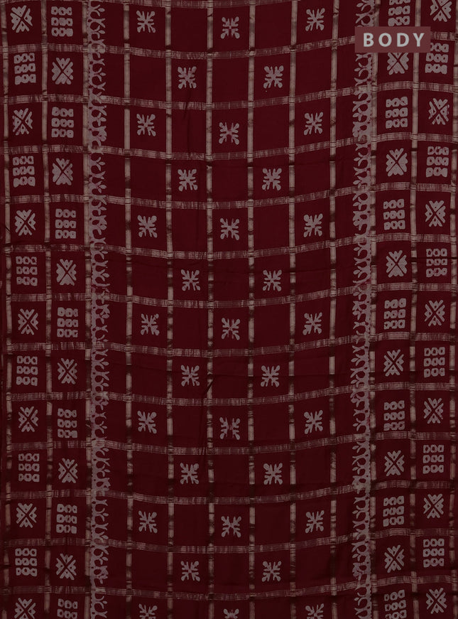 Semi chanderi saree maroon with allover zari checks & batik prints in borderless style