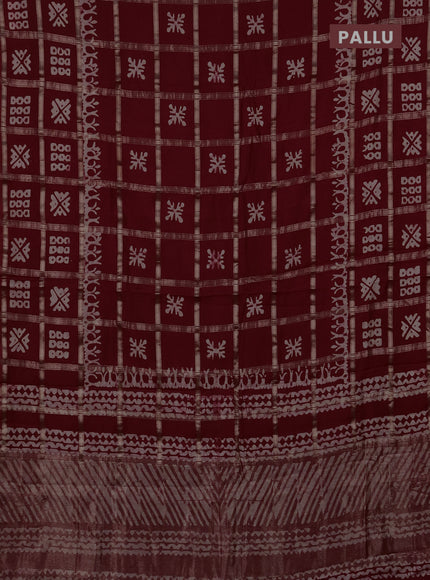 Semi chanderi saree maroon with allover zari checks & batik prints in borderless style