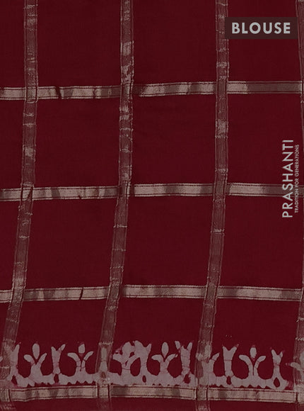 Semi chanderi saree maroon with allover zari checks & batik prints in borderless style