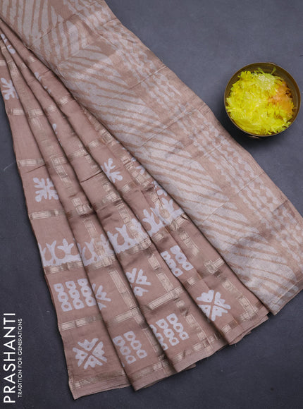 Semi chanderi saree beige with allover zari checks & batik prints in borderless style