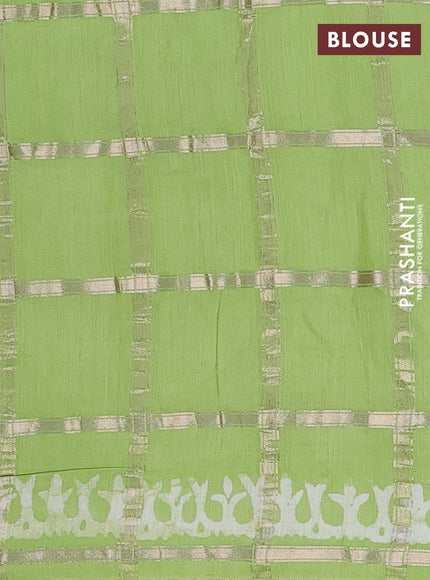 Semi chanderi saree parrot green with allover zari checks & batik prints in borderless style