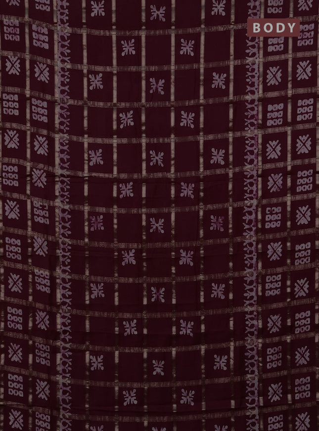 Semi chanderi saree wine shade with allover zari checks & batik prints in borderless style