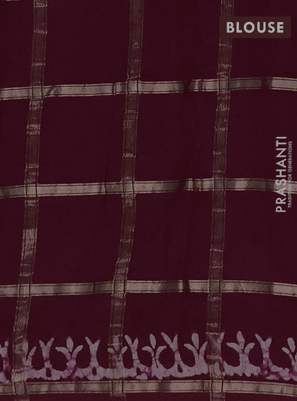 Semi chanderi saree wine shade with allover zari checks & batik prints in borderless style