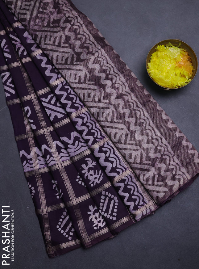 Semi chanderi saree jamun with allover zari checks & batik prints in borderless style