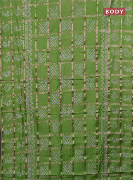 Semi chanderi saree parrot green with allover zari checks & batik prints in borderless style