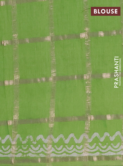 Semi chanderi saree parrot green with allover zari checks & batik prints in borderless style