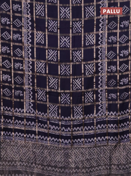 Semi chanderi saree navy blue with allover zari checks & batik prints in borderless style