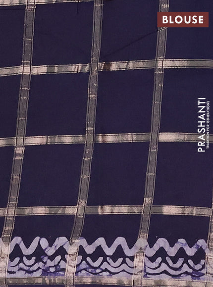 Semi chanderi saree navy blue with allover zari checks & batik prints in borderless style