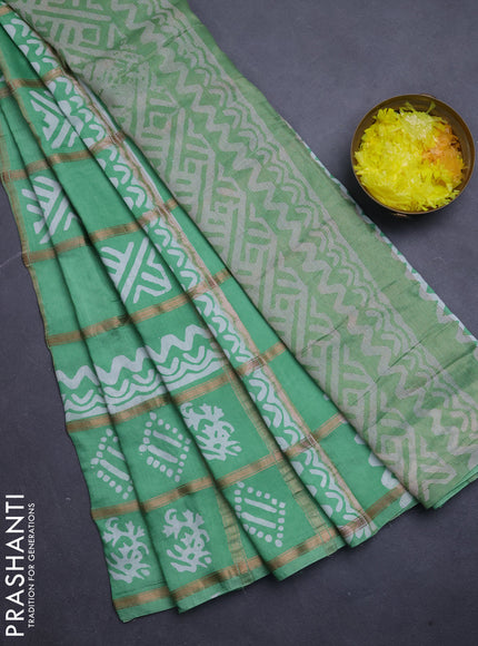 Semi chanderi saree teal green with allover zari checks & batik prints in borderless style