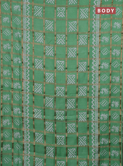 Semi chanderi saree teal green with allover zari checks & batik prints in borderless style