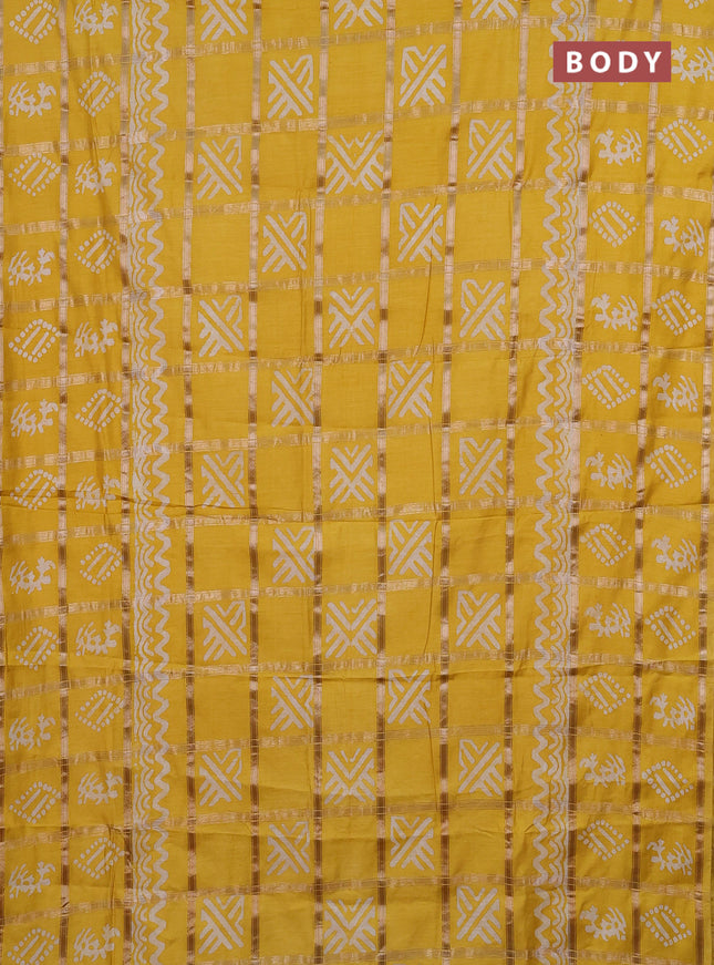 Semi chanderi saree yellow with allover zari checks & batik prints in borderless style